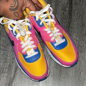 Nike Sneakers in Pink, Yellow, and Blue